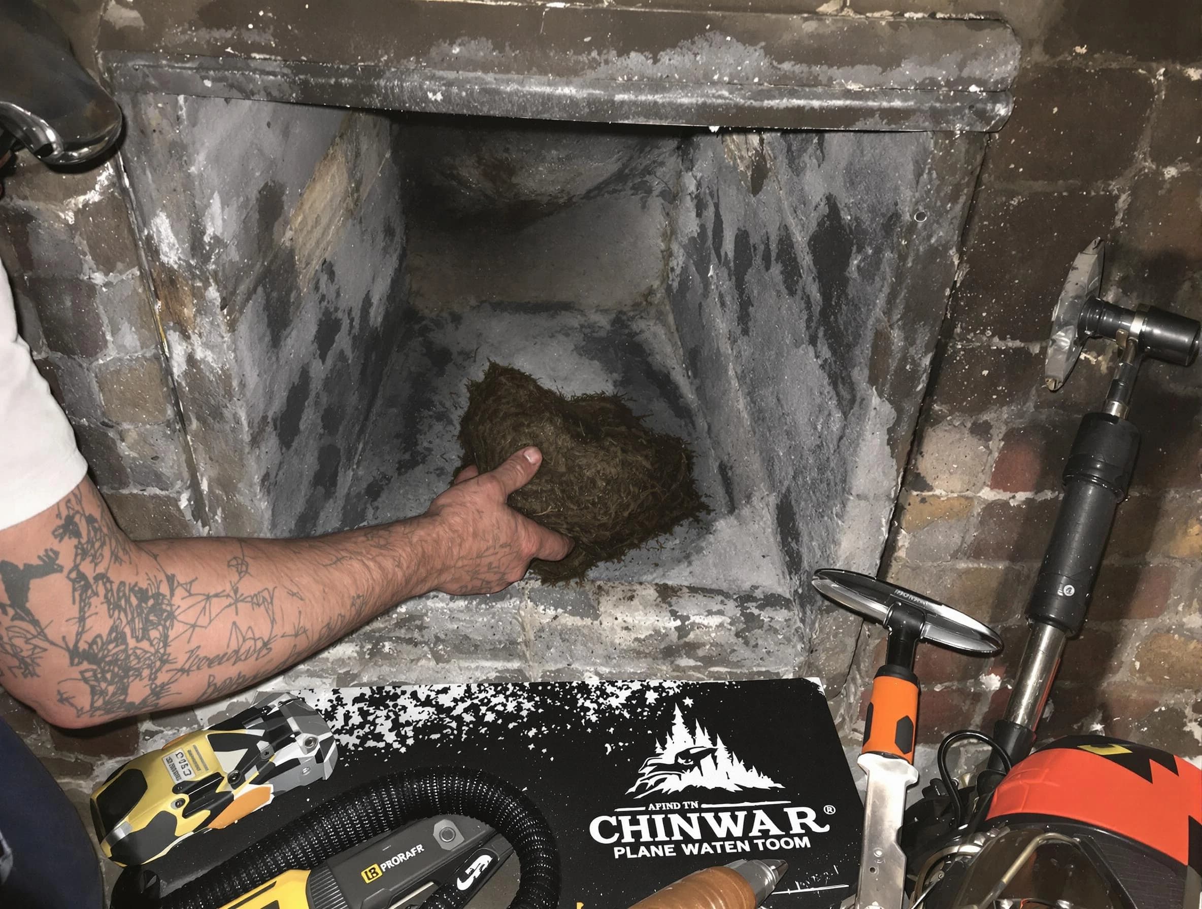 Elizabeth Chimney Sweep safely removing debris and screening chimney in Elizabeth, NJ
